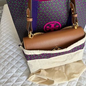 Tory Burch purse and wallet included.